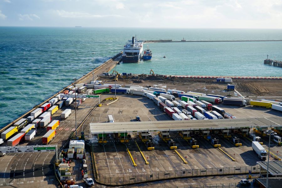 View over Dover port with freight trucks and boat